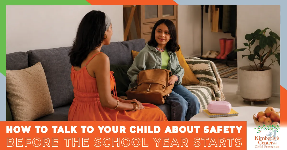 Parent talking with a child about personal safety before the school year begins.